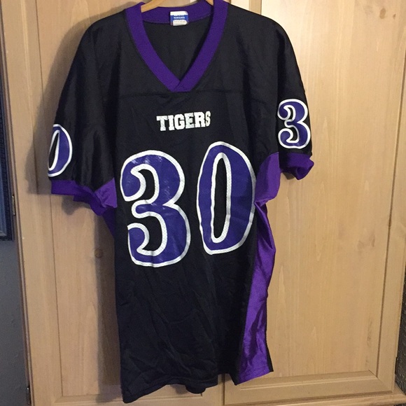 purple and white football jersey
